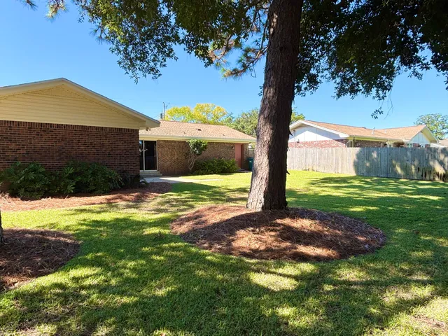 a view of a backyard with a garden