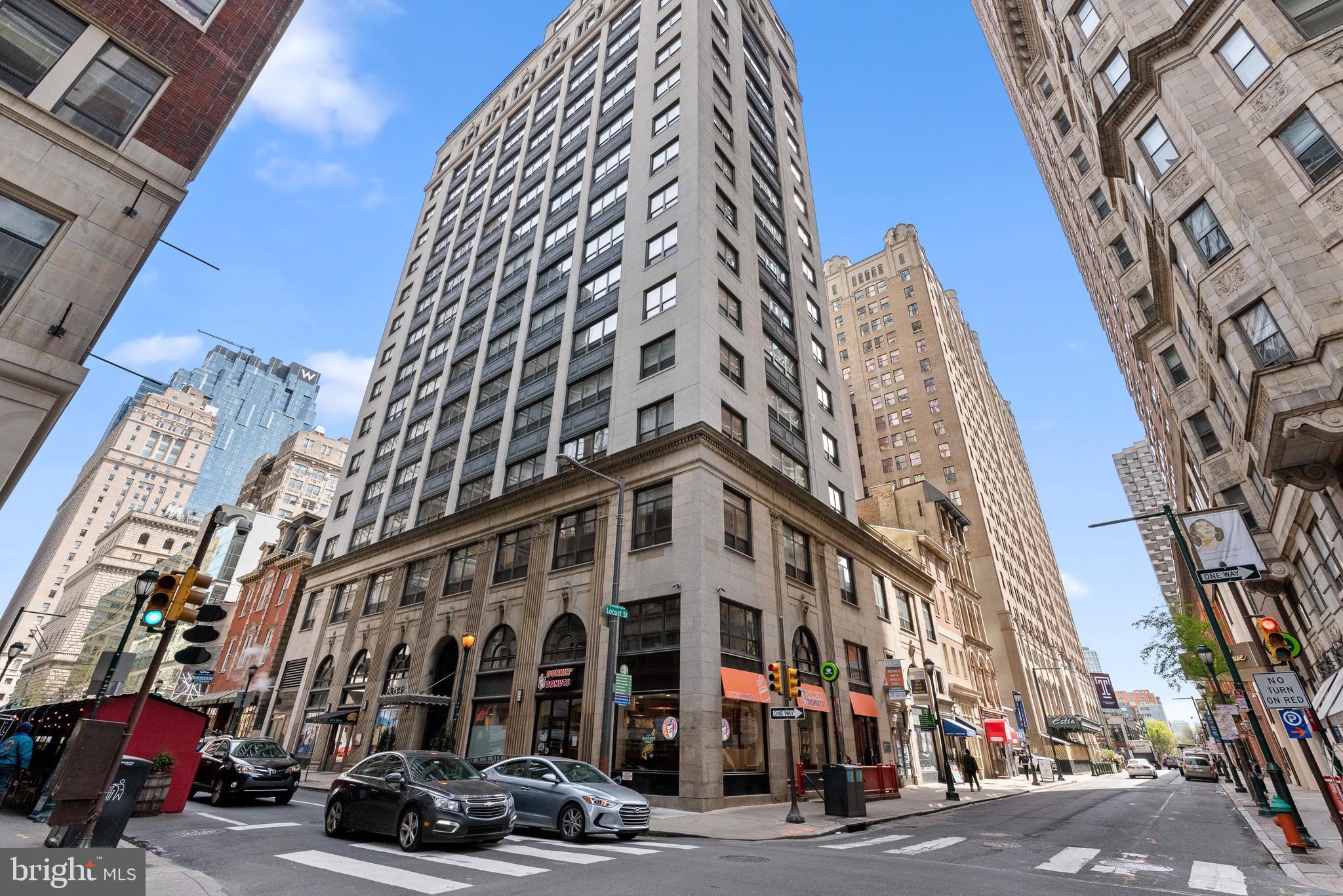 1425 Locust Street, Unit 9E Philadelphia, PA 19102 - Photo 2 of 15 a city street lined with tall buildings