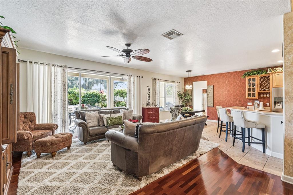 3304 Beazer Drive Ocoee, FL 34761 - Photo 11 of 53 a living room with furniture and a large window