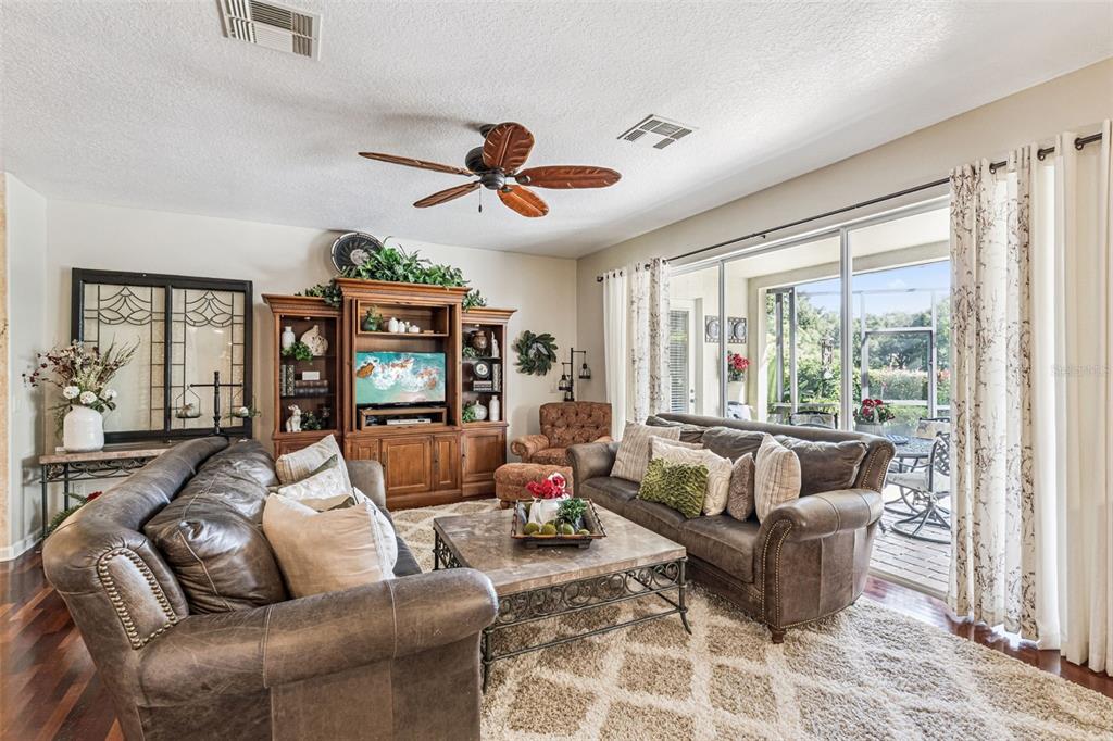 3304 Beazer Drive Ocoee, FL 34761 - Photo 13 of 53 a living room with furniture and a large window