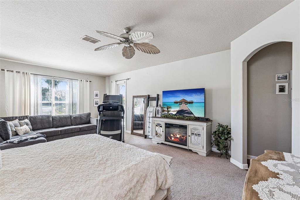 3304 Beazer Drive Ocoee, FL 34761 - Photo 21 of 53 a bedroom with a bed and a television