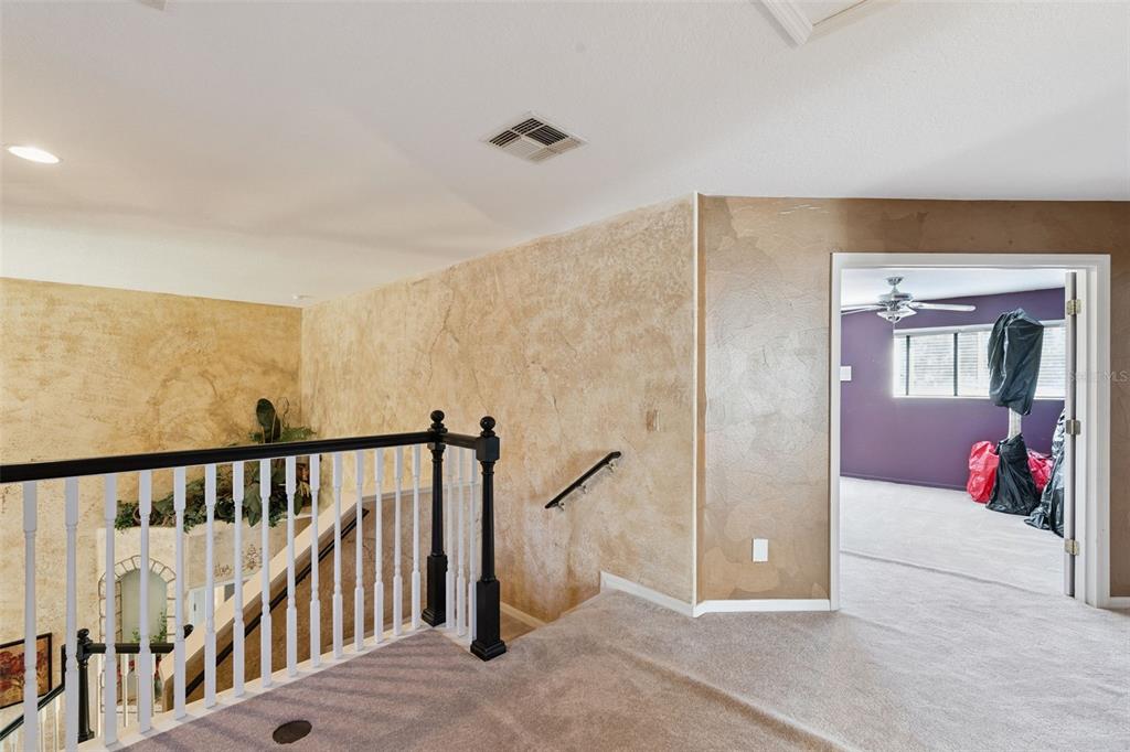 3304 Beazer Drive Ocoee, FL 34761 - Photo 27 of 53 a view of a hallway with a livingroom and entryway