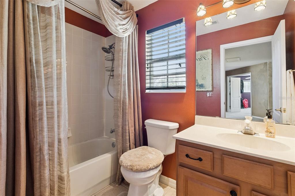 3304 Beazer Drive Ocoee, FL 34761 - Photo 39 of 53 a bathroom with a sink toilet and shower