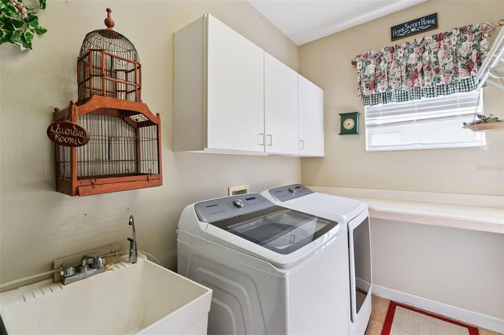 3304 Beazer Drive Ocoee, FL 34761 - Photo 40 of 53 a bathroom with a sink a toilet and a mirror