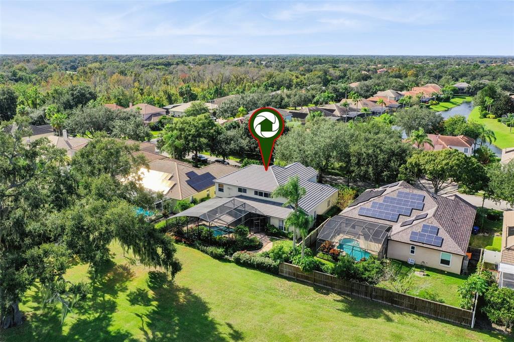 3304 Beazer Drive Ocoee, FL 34761 - Photo 49 of 53 an aerial view of a house with a garden