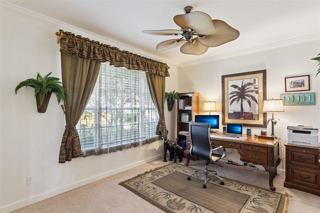 3304 Beazer Drive Ocoee, FL 34761 - Photo 7 of 53 a view of a livingroom with workspace and a window