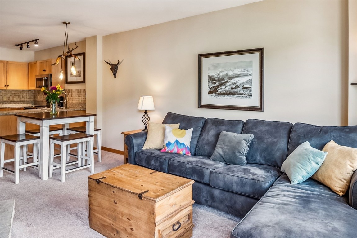100 Dercum Square, Unit 8386 Keystone, CO 80435 - Photo 12 of 34 a living room with furniture and a table