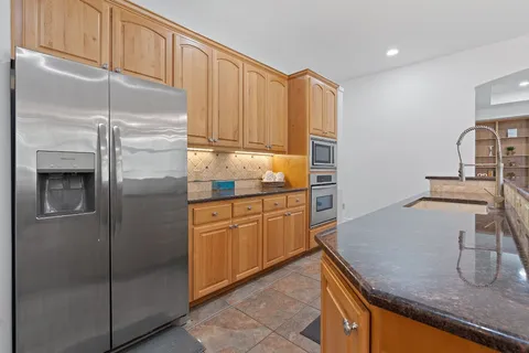 $599,990 | 18 Tourney Lane, The Hills, TX 78738