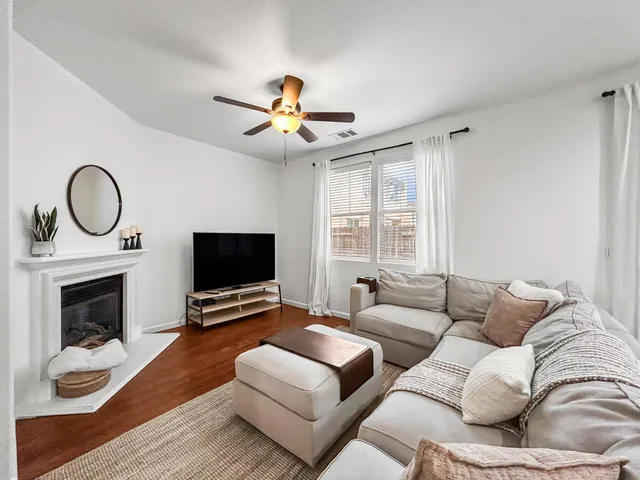 a view of a dining room with furniture and a livingroom