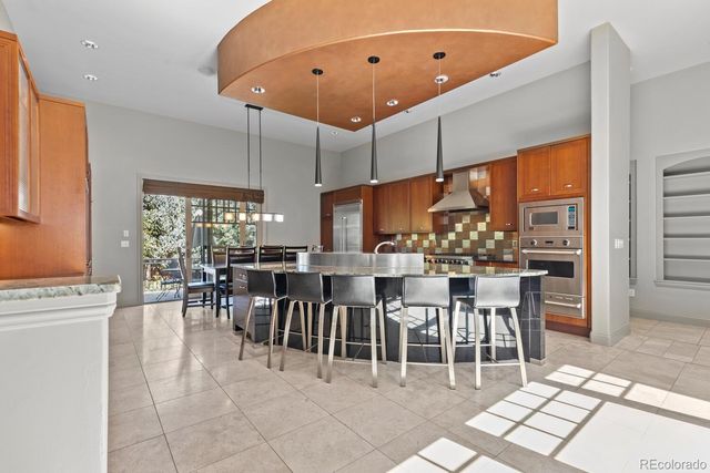 a group of people sitting in a living room