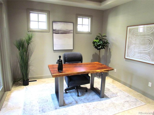 a room with furniture and a window