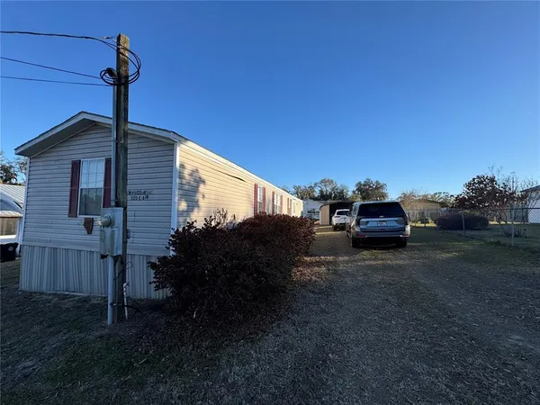 a car parked in front of a house