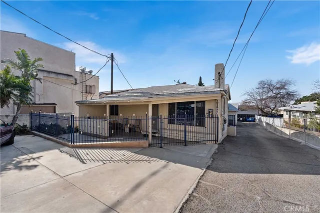 a view of a house with sitting area and furniture