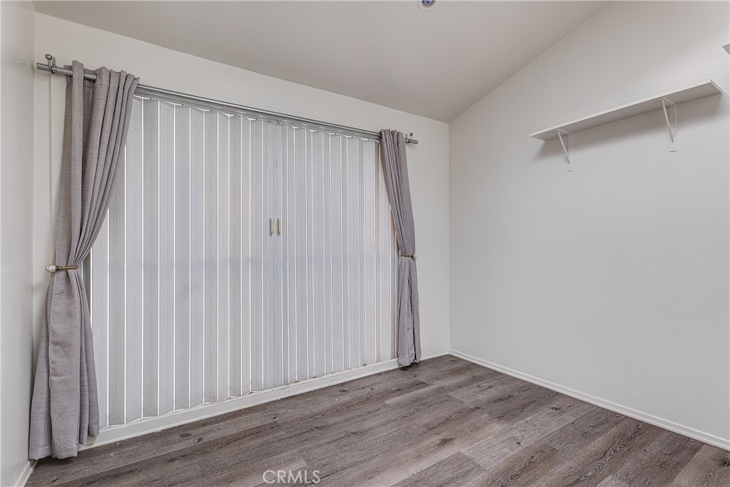 10139 Hillhaven Avenue Tujunga, CA 91042 - Photo 28 of 47 a view of a garage with wooden floor