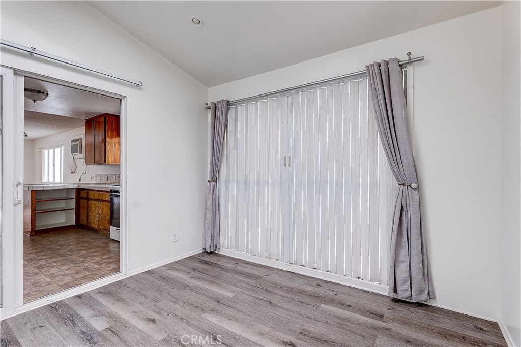 10139 Hillhaven Avenue Tujunga, CA 91042 - Photo 29 of 47 a view of a room with wooden floor and a bathroom
