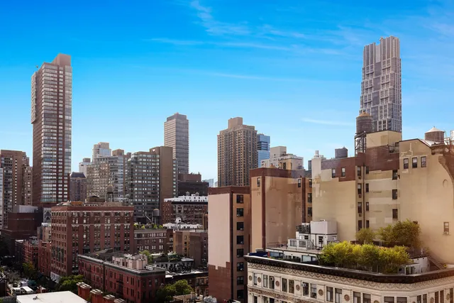 a city view with tall buildings