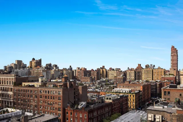 a city view with tall buildings