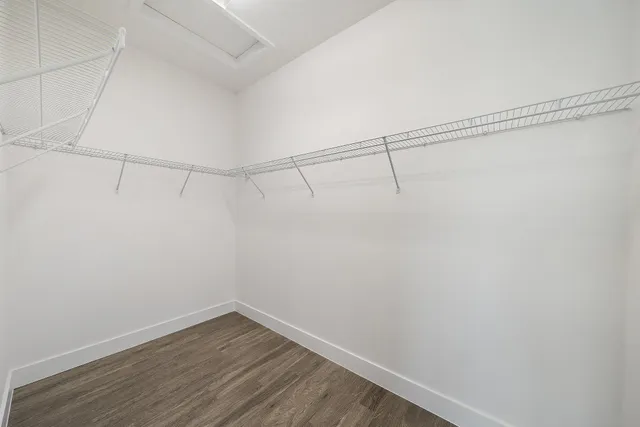 a view of a room with racks on the wall