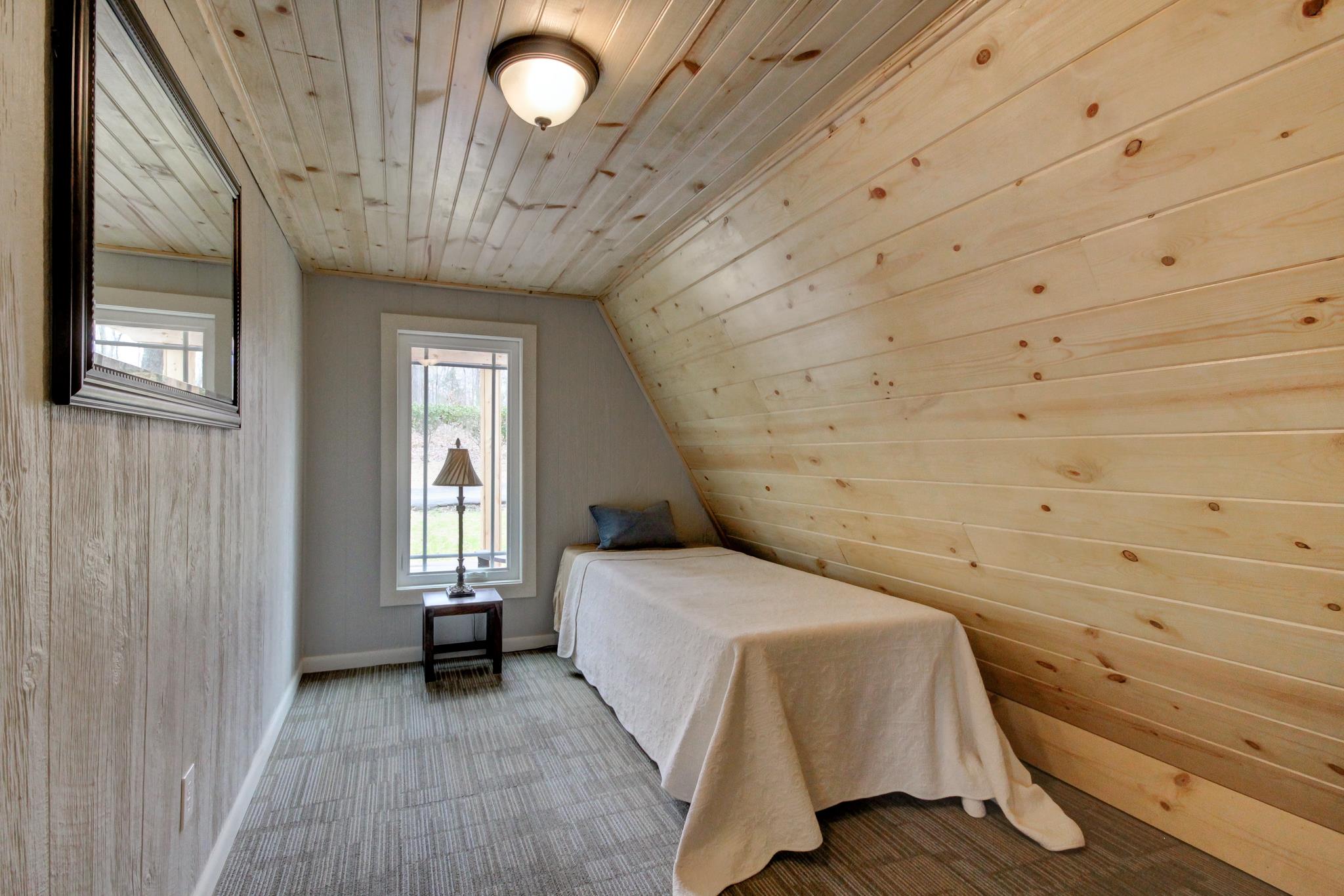 446 Harper Road Clarksville, TN 37043 - Photo 11 of 25 a bedroom with a bed and a window
