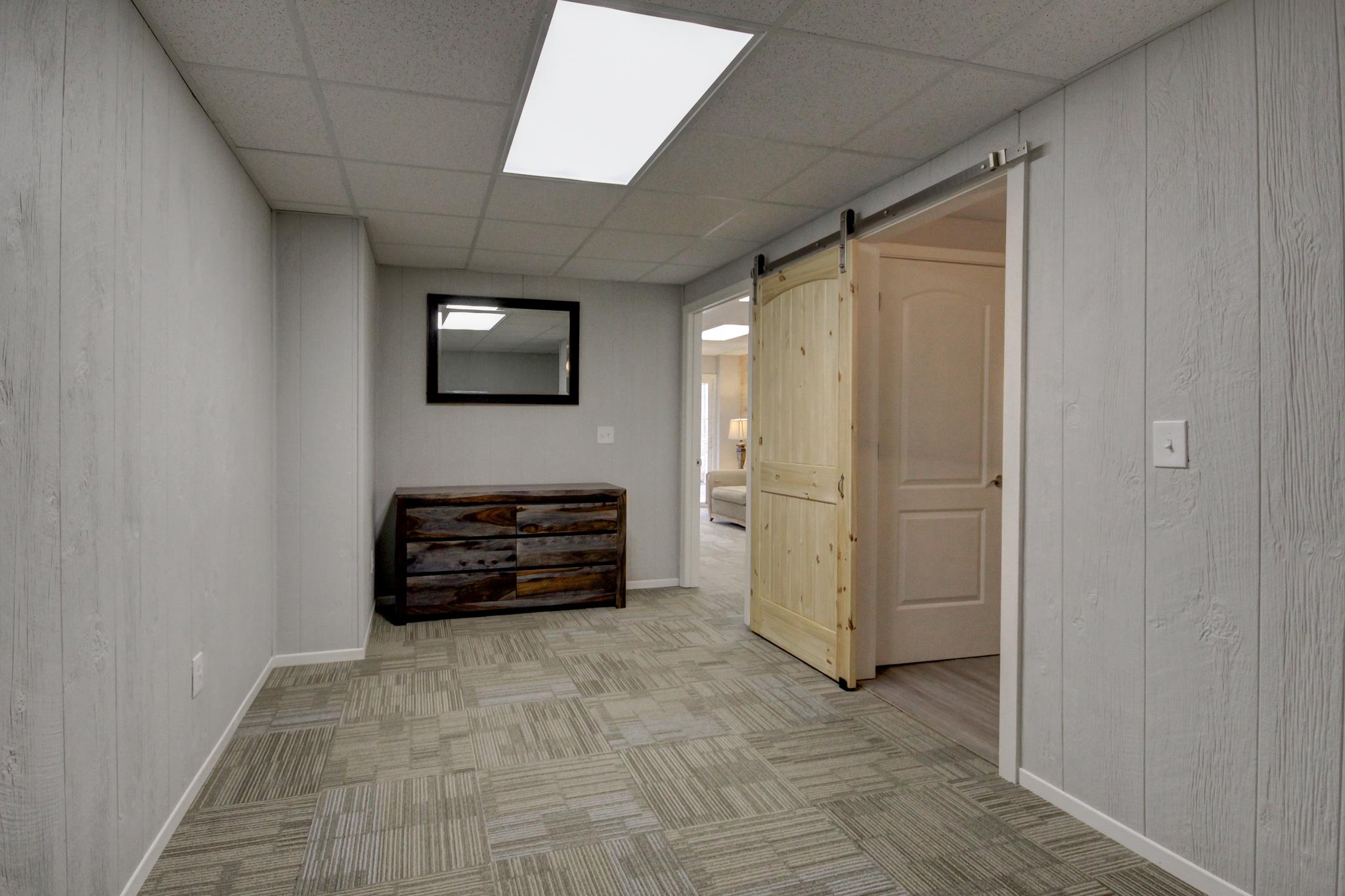 446 Harper Road Clarksville, TN 37043 - Photo 19 of 25 a room with furniture and a flat screen tv