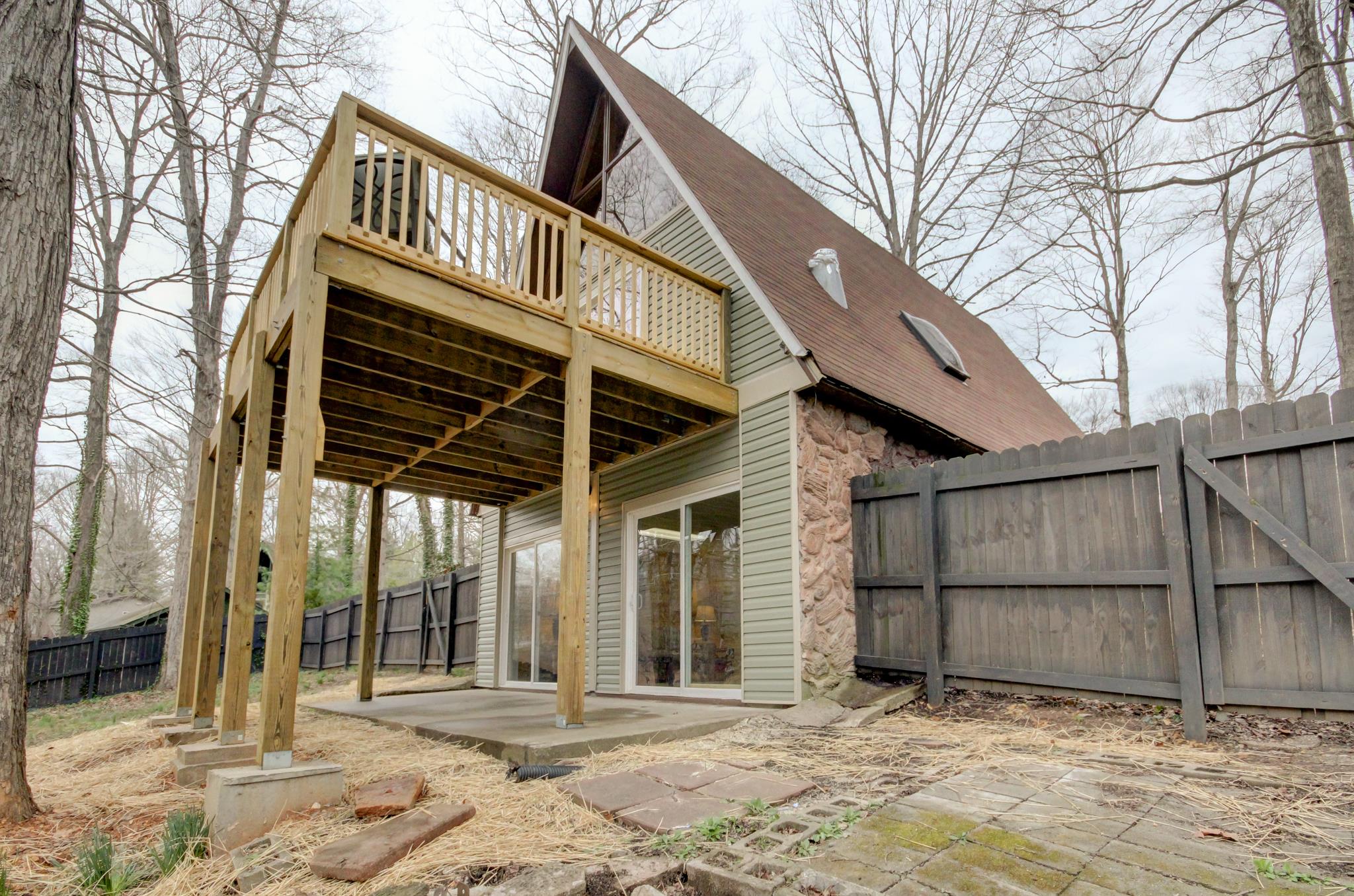 446 Harper Road Clarksville, TN 37043 - Photo 23 of 25 a view of a house with a wooden fence