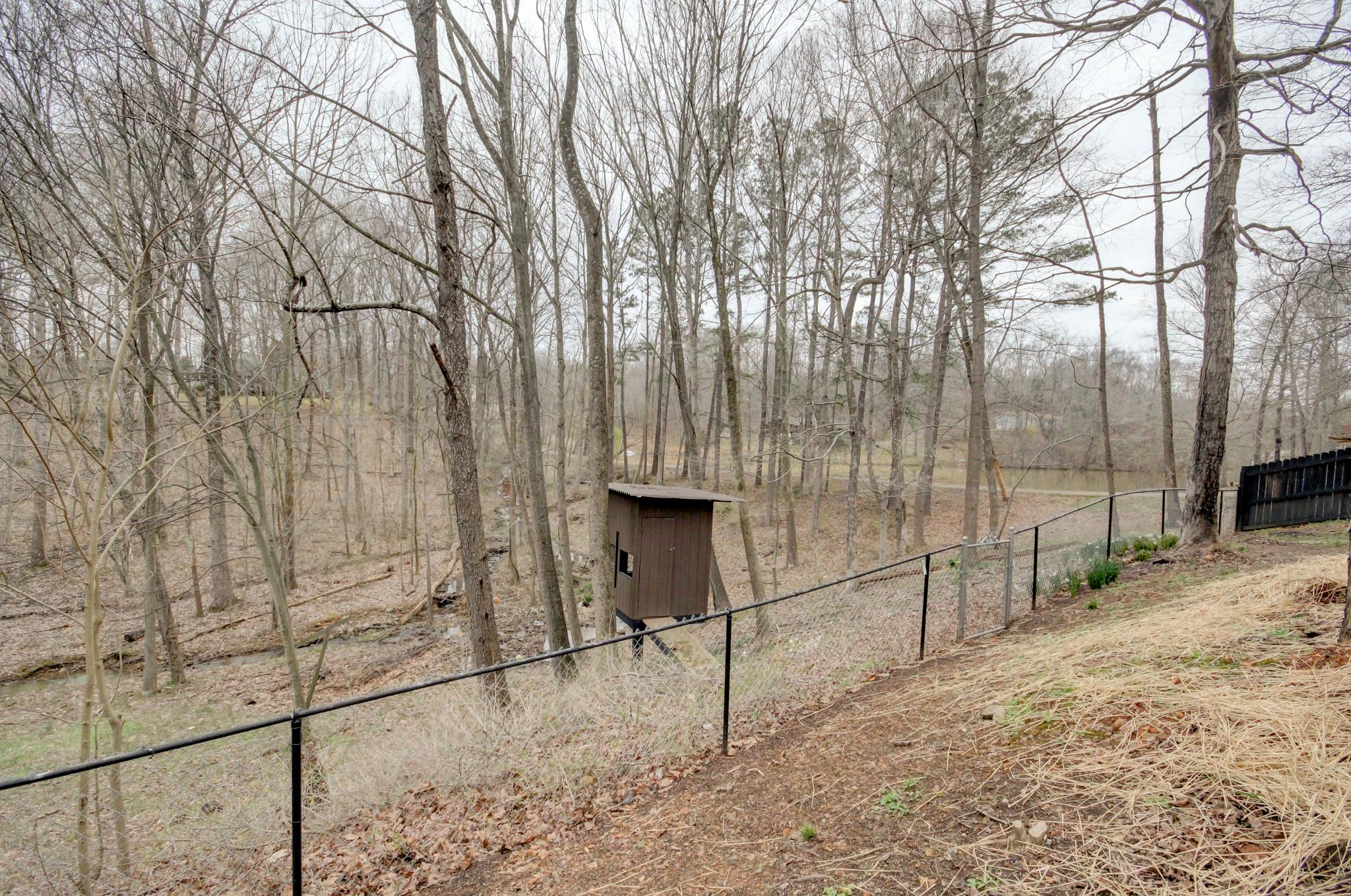 446 Harper Road Clarksville, TN 37043 - Photo 24 of 25 a view of backyard with wooden fence