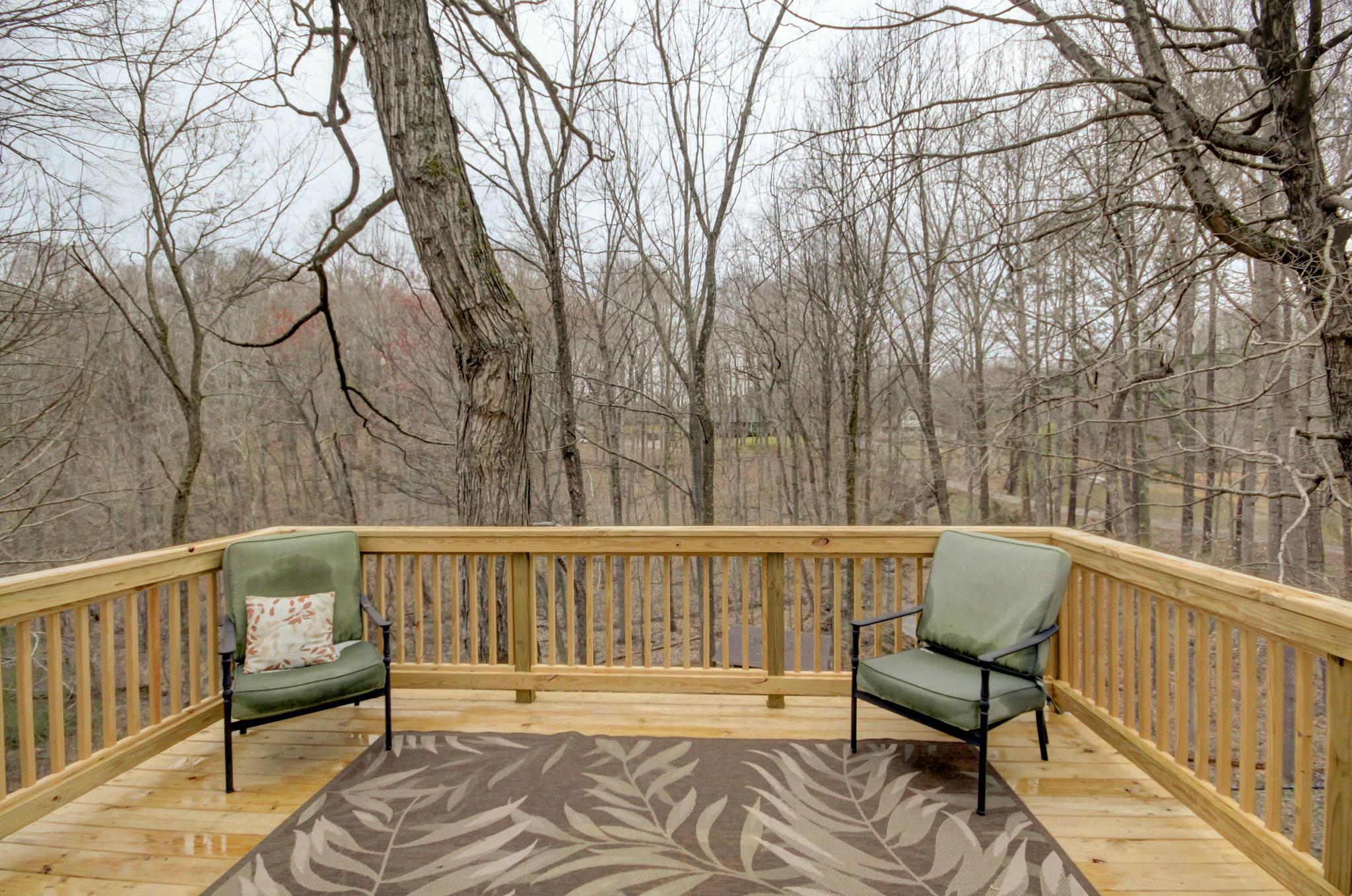 446 Harper Road Clarksville, TN 37043 - Photo 7 of 25 a view of a chairs in a balcony