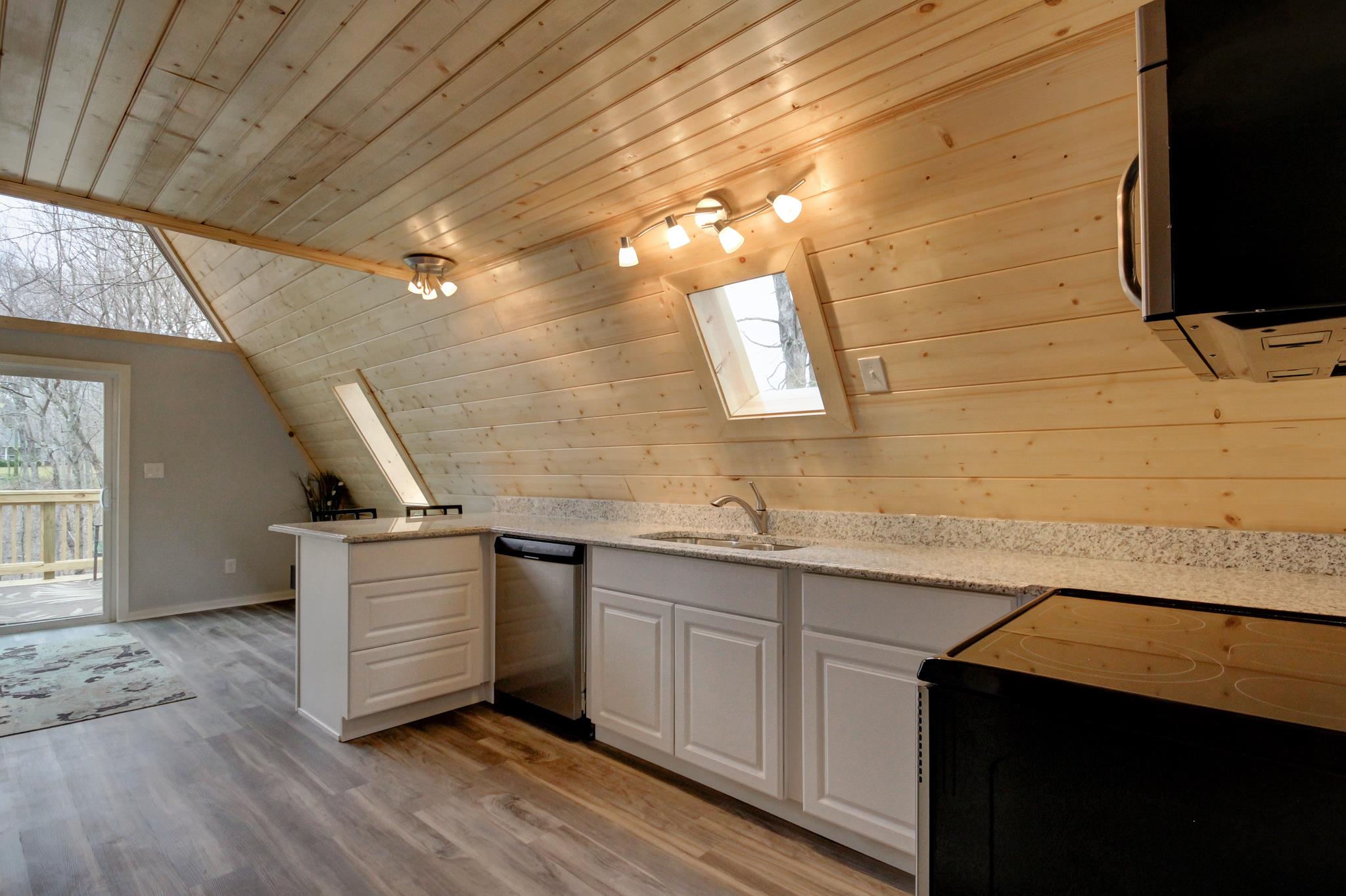 446 Harper Road Clarksville, TN 37043 - Photo 10 of 25 a kitchen with a sink and cabinets