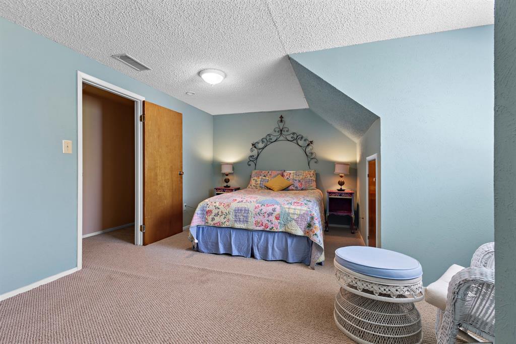 118 Cinch Buckle Ranch Road Trinidad, TX 75163 - Photo 14 of 28 a bedroom with a bed and a closet