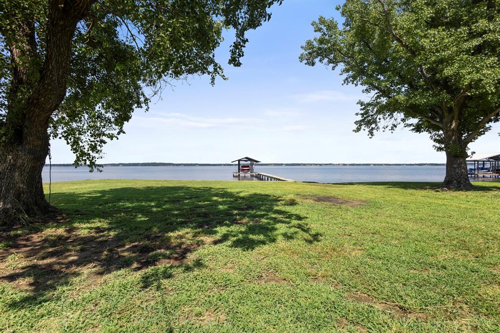 118 Cinch Buckle Ranch Road Trinidad, TX 75163 - Photo 23 of 28 a view of an ocean and beach