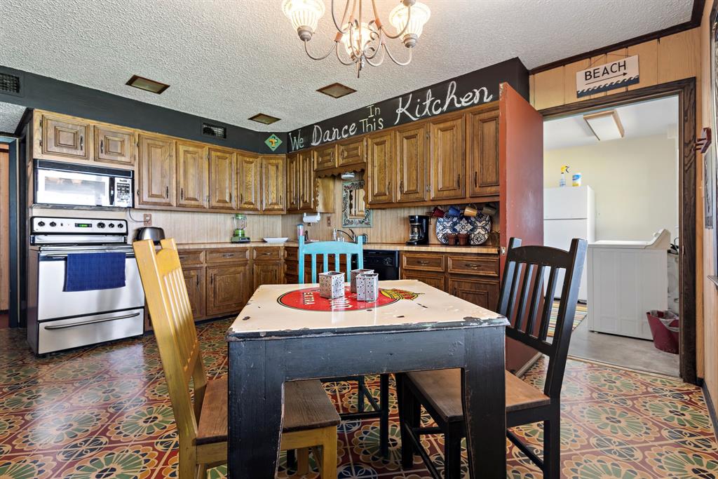 118 Cinch Buckle Ranch Road Trinidad, TX 75163 - Photo 7 of 28 a view of a dining room with furniture window and wooden floor