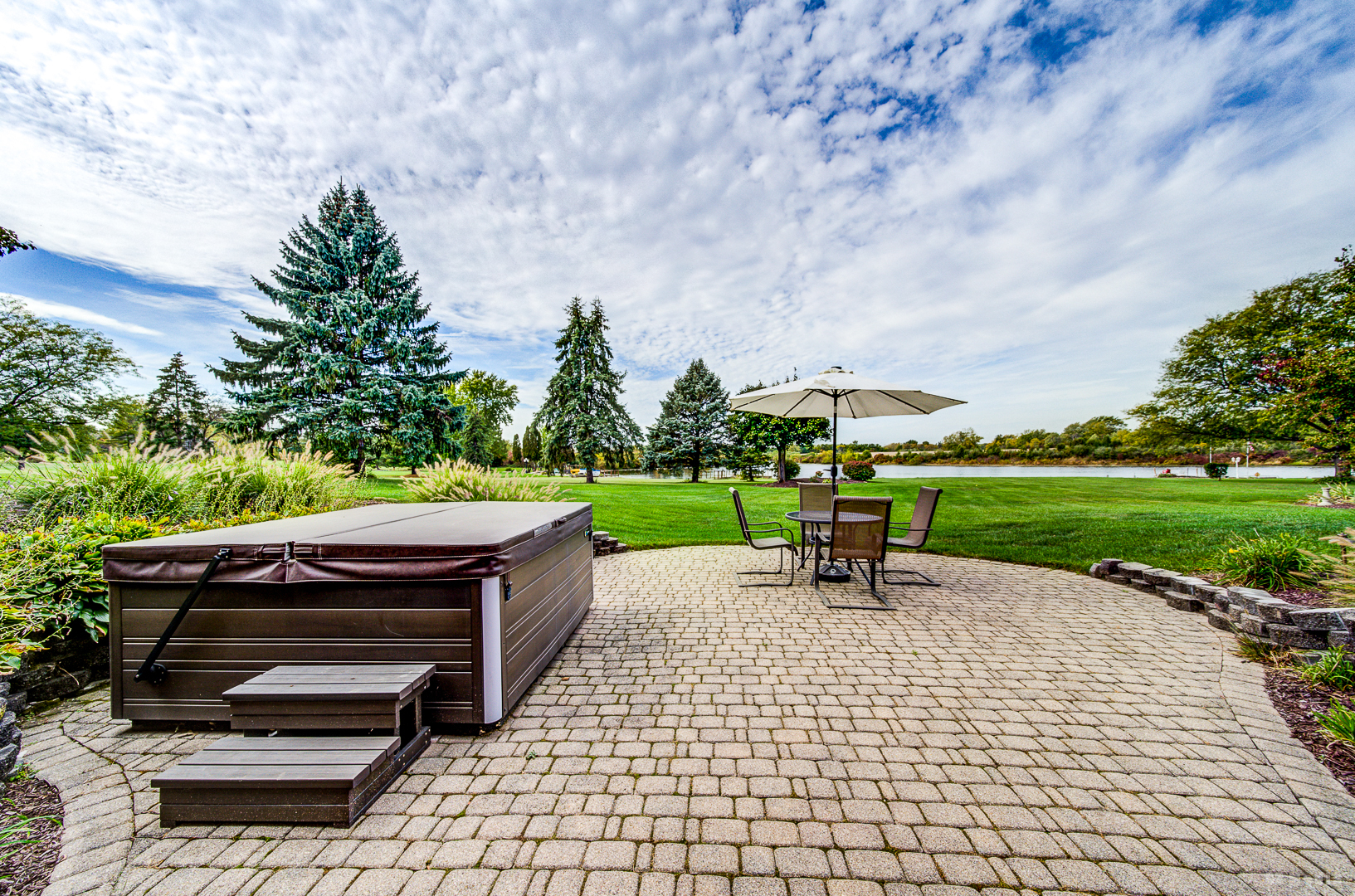 26002 Cambridge Drive Crete, IL 60417 - Photo 40 of 48 a park view with a bench in garden