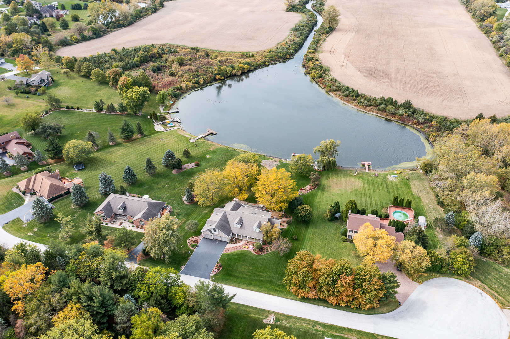 26002 Cambridge Drive Crete, IL 60417 - Photo 41 of 48 an aerial view of a house with a yard and lake view