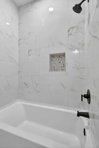 a bathroom with a bathtub