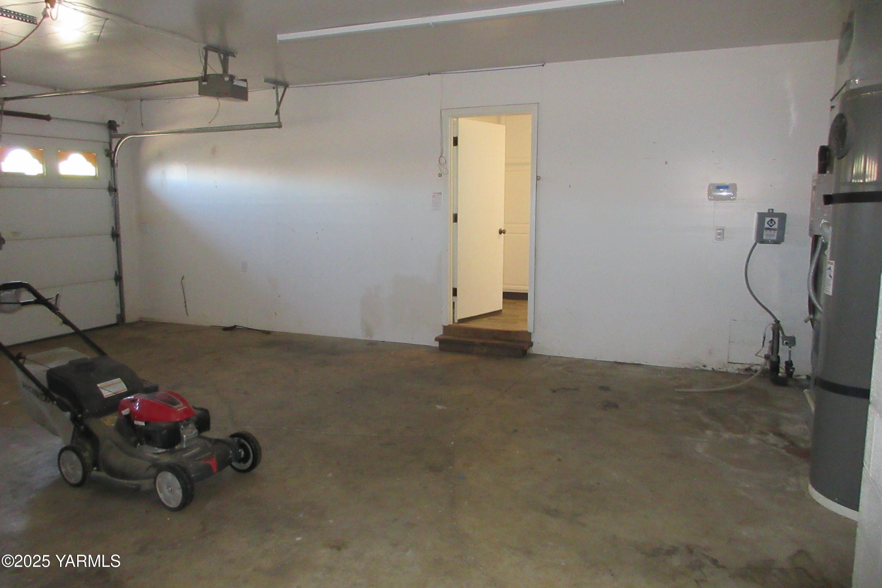 80 Hickory Lane Selah, WA 98942 - Photo 24 of 24 a room with water heater and white walls