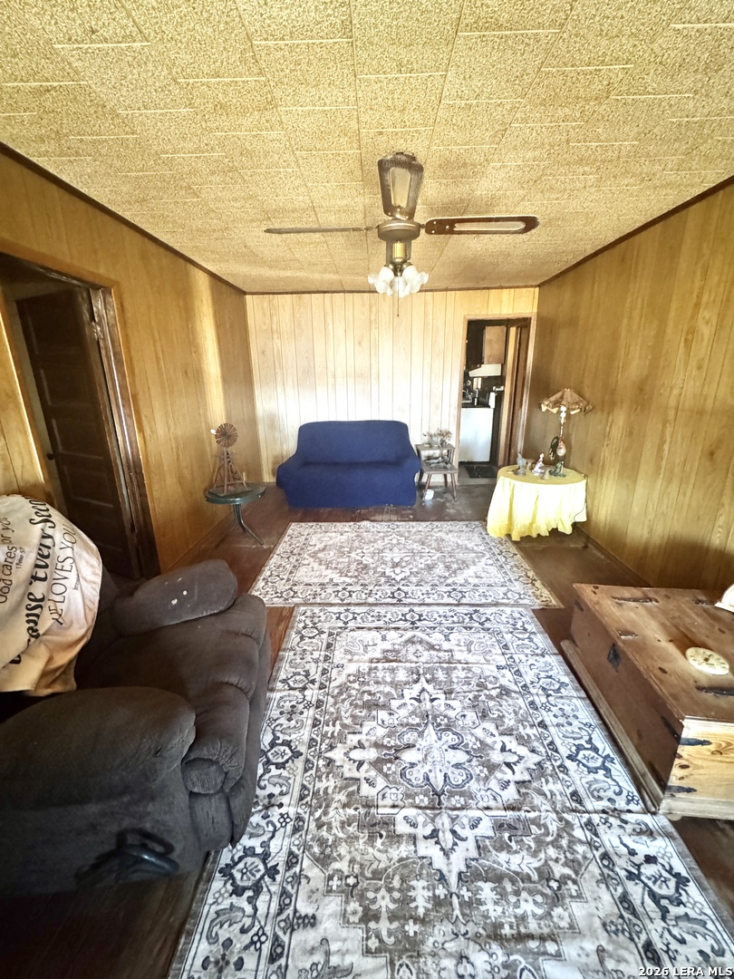 1580 Middle Road George West, TX 78022 - Photo 6 of 15 a view of a bedroom with wooden floor