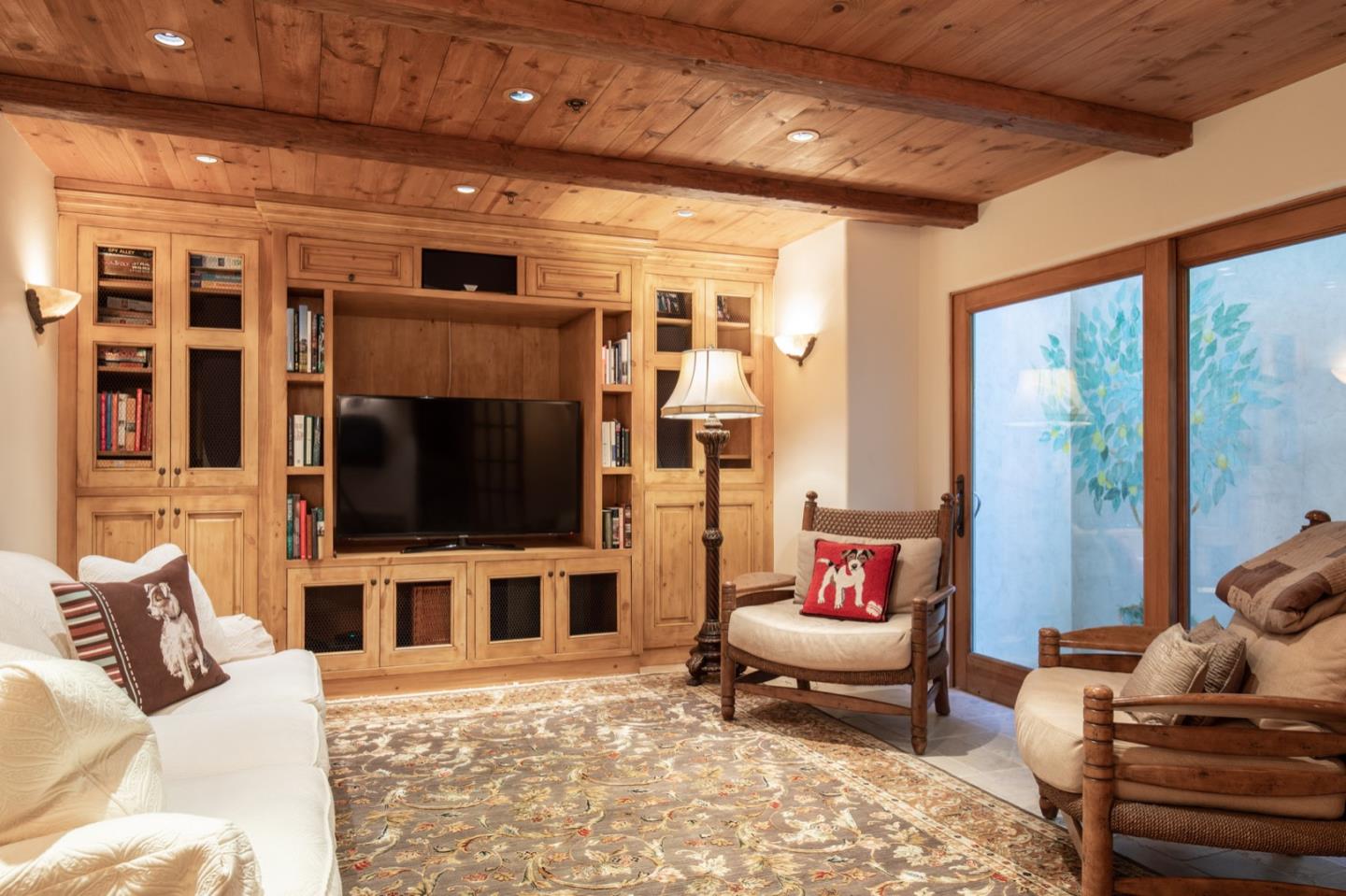 26255 Ocean View Avenue Carmel, CA 93923 - Photo 11 of 20 a living room with furniture and a flat screen tv