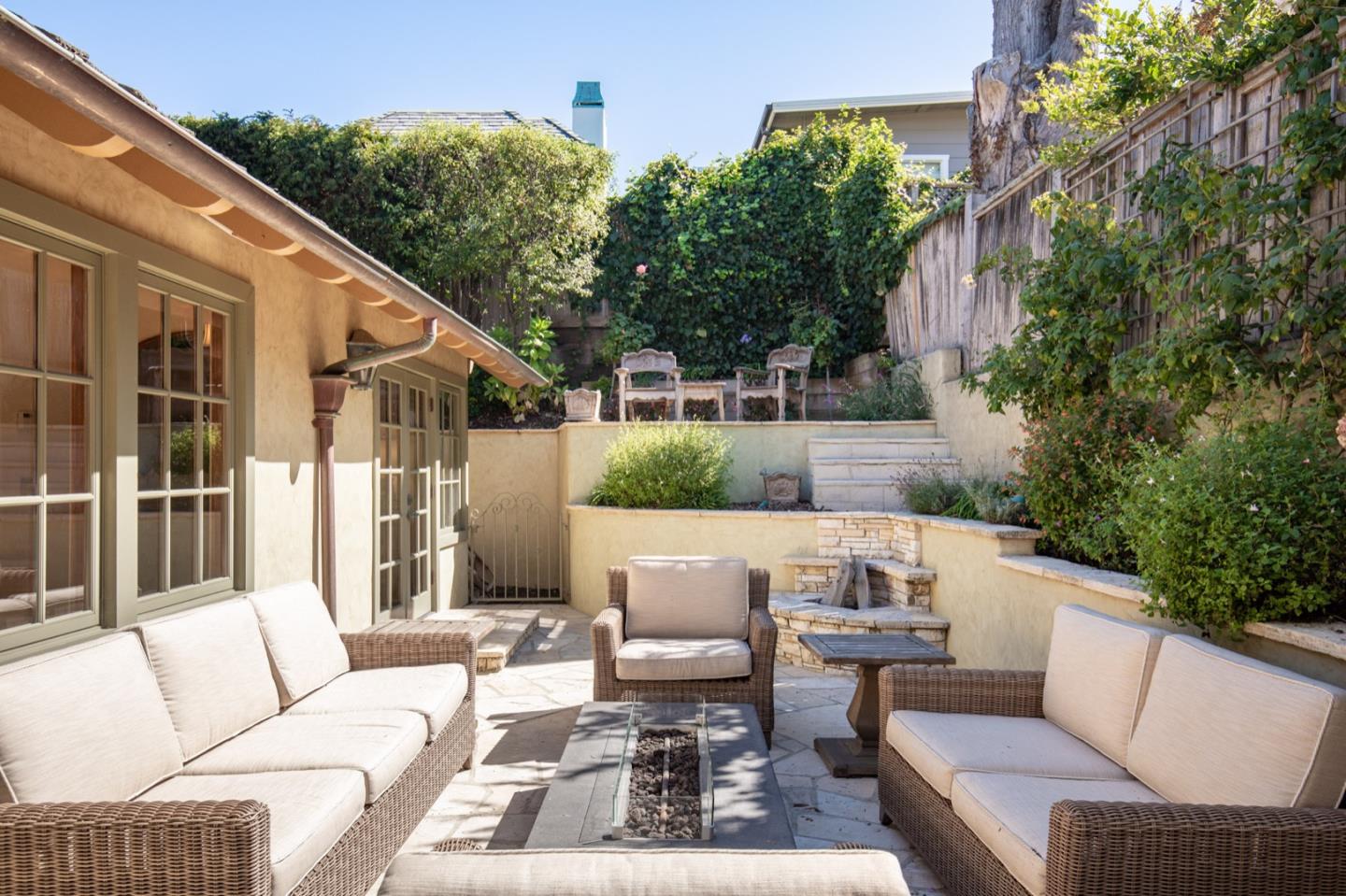 26255 Ocean View Avenue Carmel, CA 93923 - Photo 18 of 20 a view of a patio in the backyard