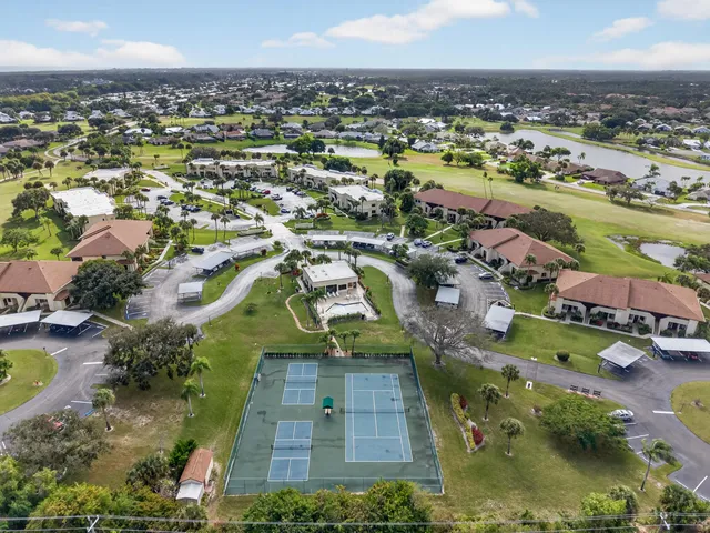 an aerial view of a house with garden