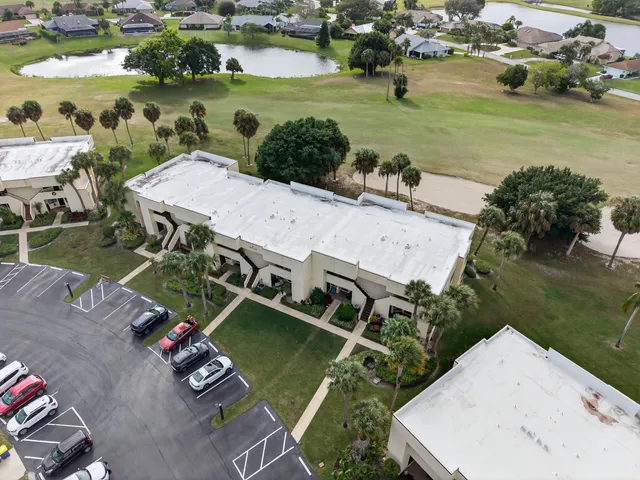 an aerial view of a house with a garden