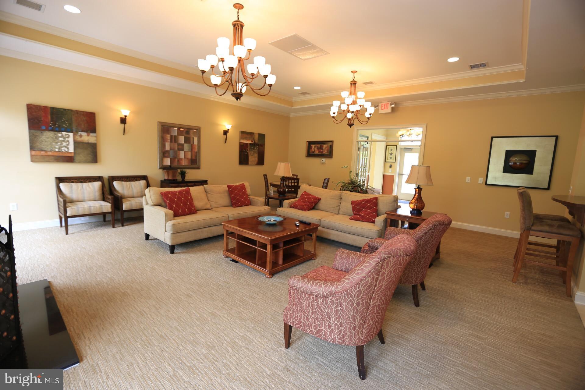 413 Timberlake Drive Ewing, NJ 08618 - Photo 12 of 26 a living room with furniture and a chandelier