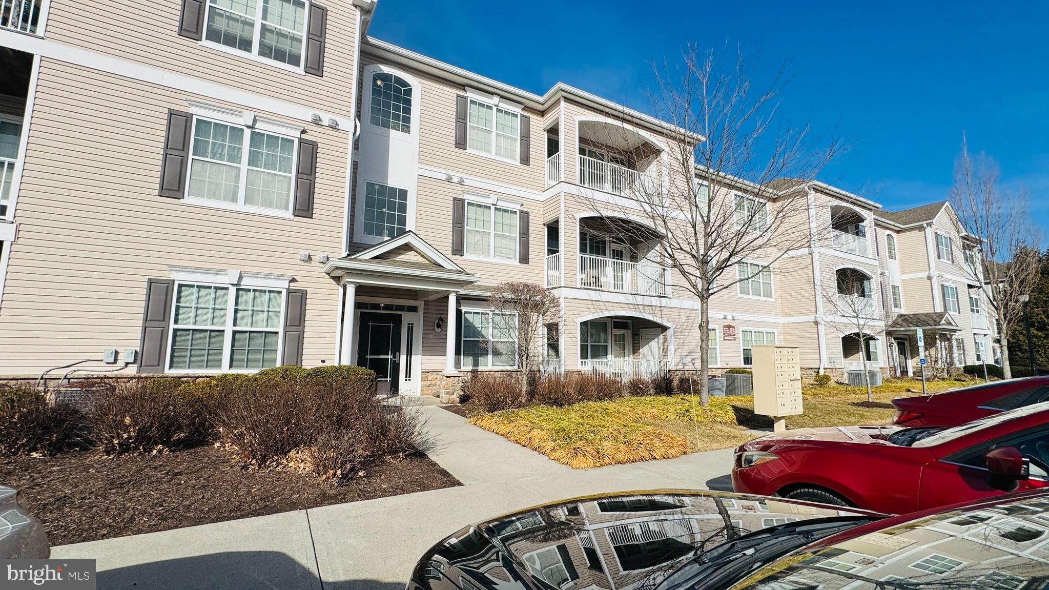 413 Timberlake Drive Ewing, NJ 08618 - Photo 23 of 26 a view of a white building among the yard