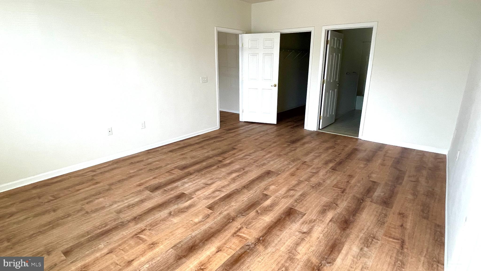 413 Timberlake Drive Ewing, NJ 08618 - Photo 6 of 26 a view of empty room with wooden floor