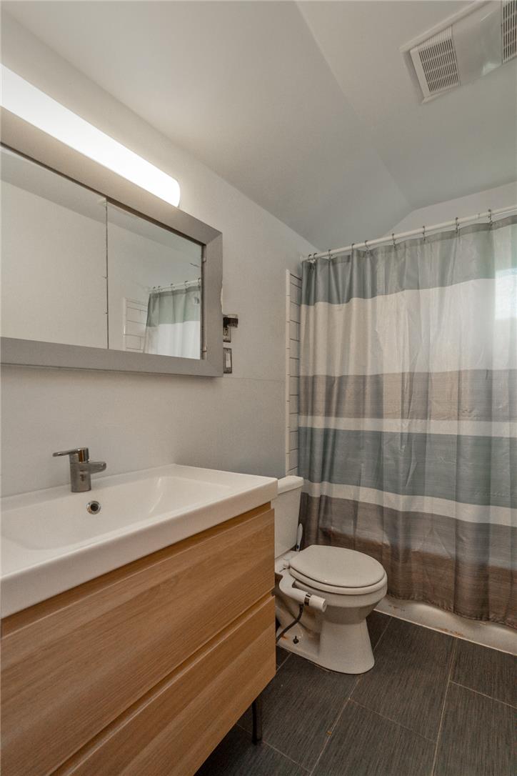 3031 Shakespeare Road Bethlehem, PA 18017 - Photo 19 of 30 A well-lit bathroom showcases a contemporary vanity and a spacious shower.