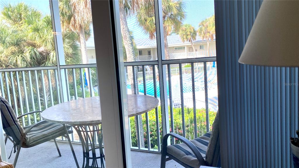 500 South Washington Drive, Unit 24B Sarasota, FL 34236 - Photo 4 of 25 a view from a dining room with furniture window and outside view
