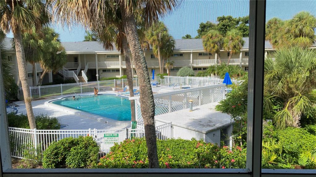 500 South Washington Drive, Unit 24B Sarasota, FL 34236 - Photo 6 of 25 front view of a house with a yard