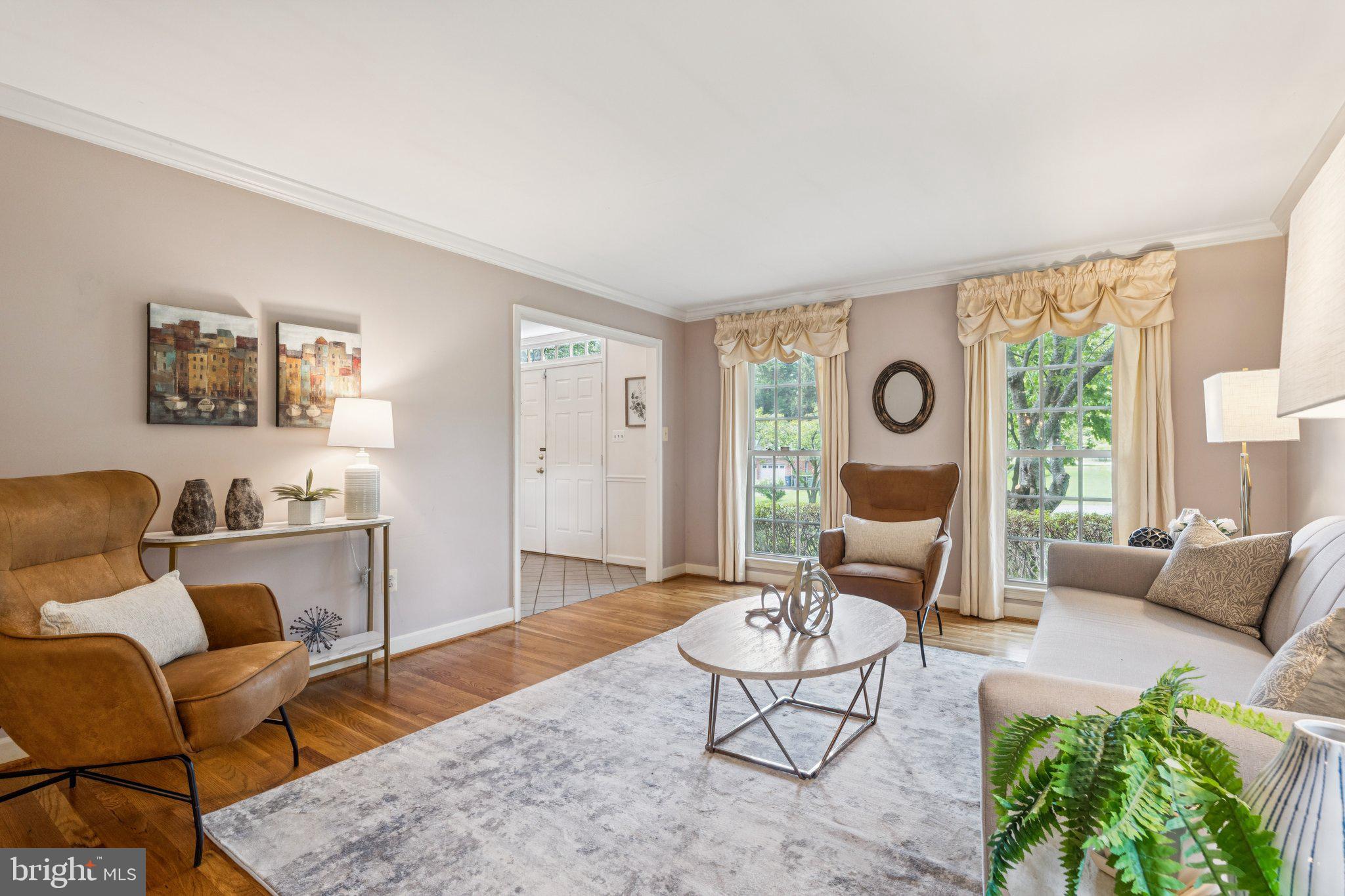 15313 Watergate Road Silver Spring, MD 20905 - Photo 11 of 53 a living room with furniture and a large window