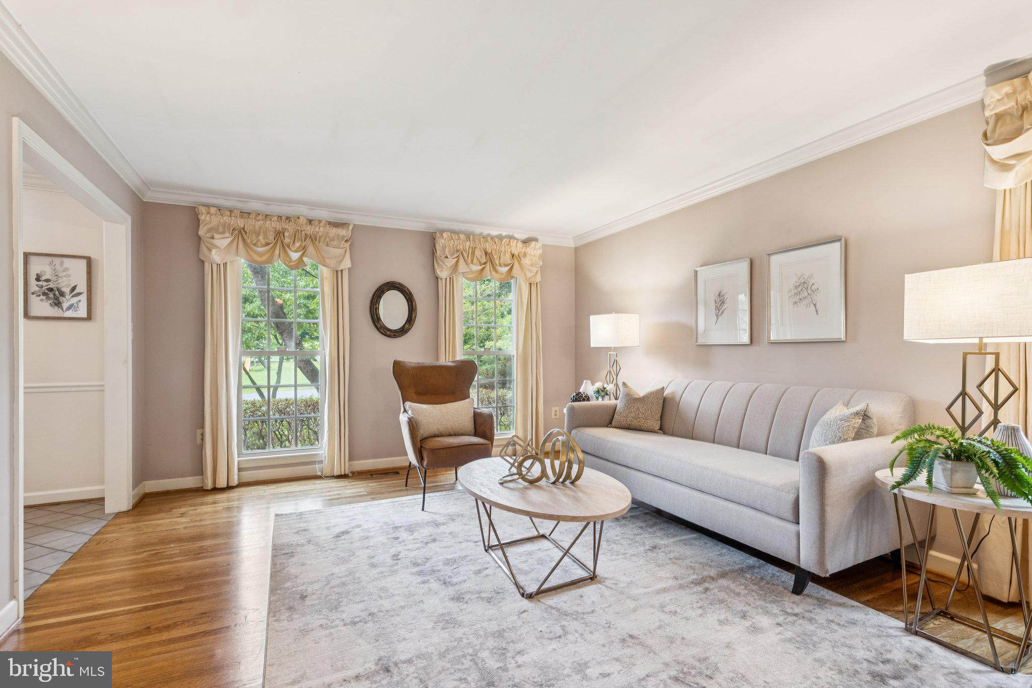 15313 Watergate Road Silver Spring, MD 20905 - Photo 12 of 53 a living room with furniture and a large window