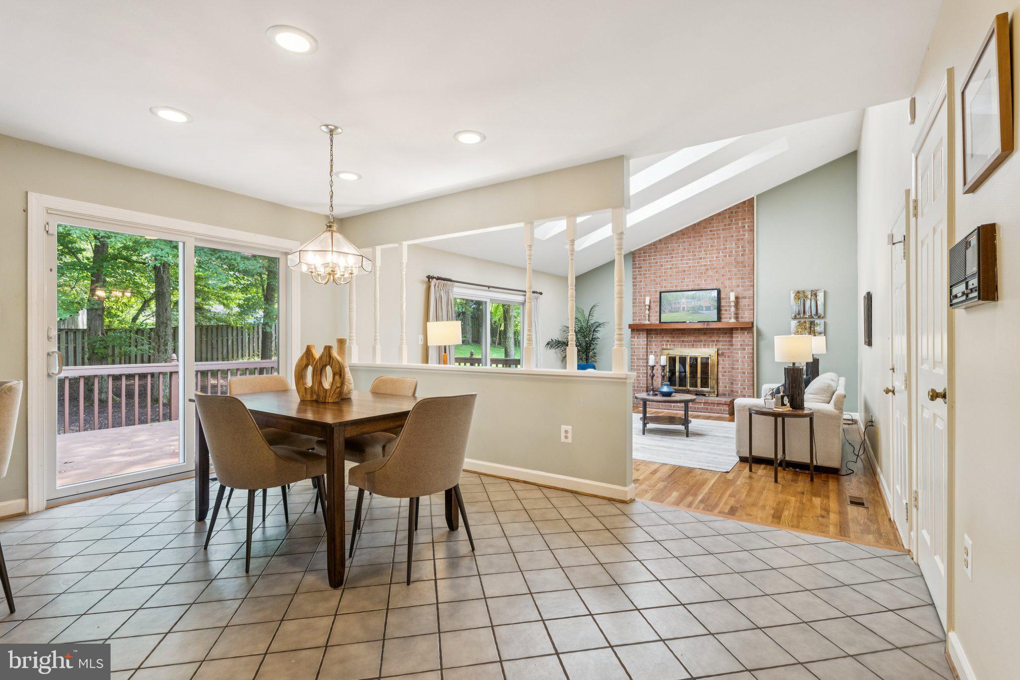 15313 Watergate Road Silver Spring, MD 20905 - Photo 16 of 53 a view of a dining room with furniture window and wooden floor