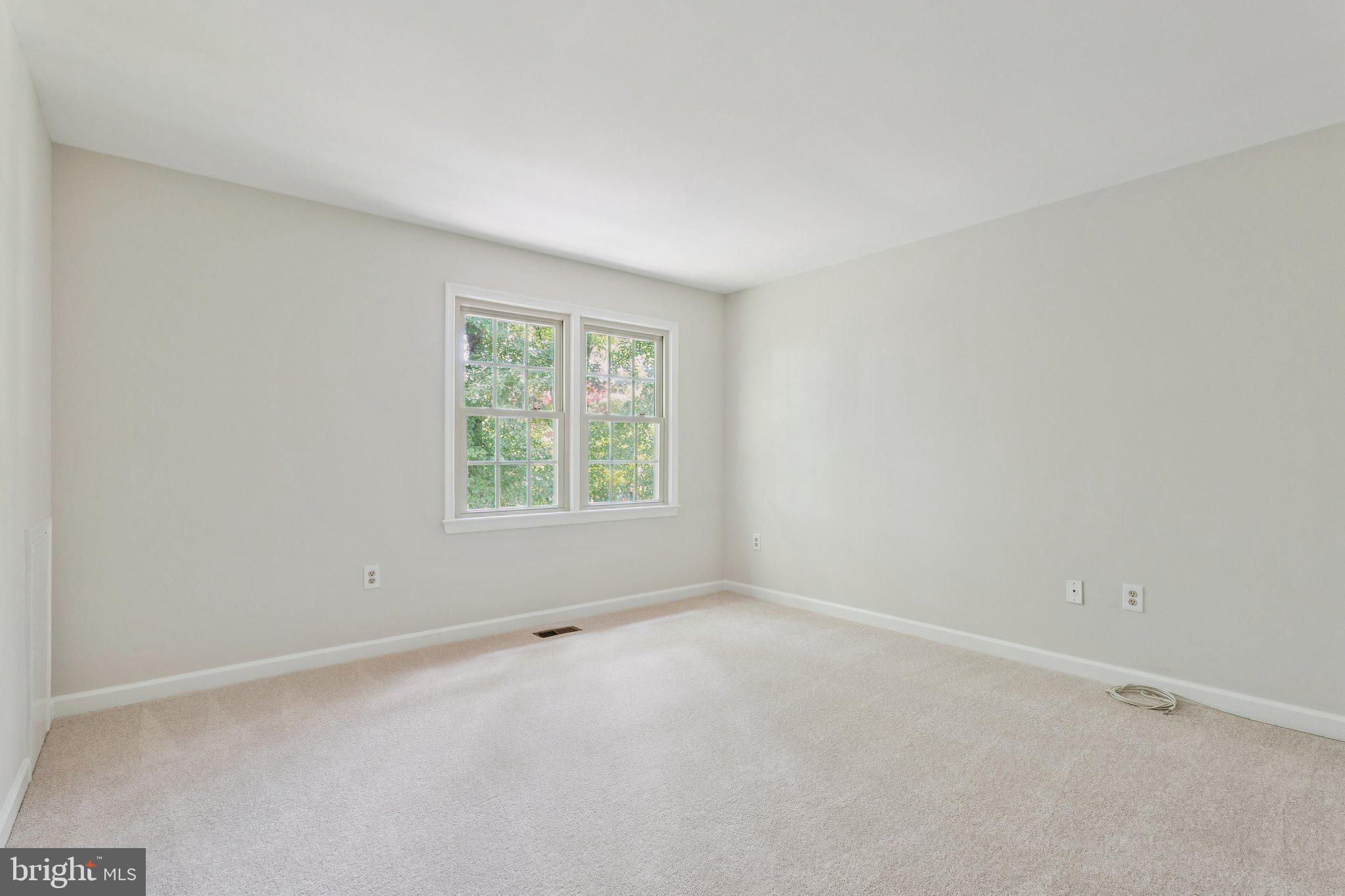 15313 Watergate Road Silver Spring, MD 20905 - Photo 22 of 53 an empty room with a window
